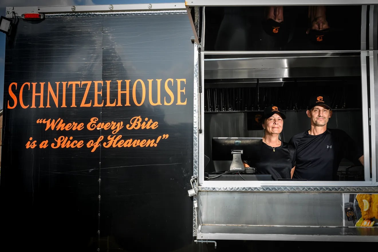 Angela and Erhard Koch at the Schnitzelhouse food truck service window