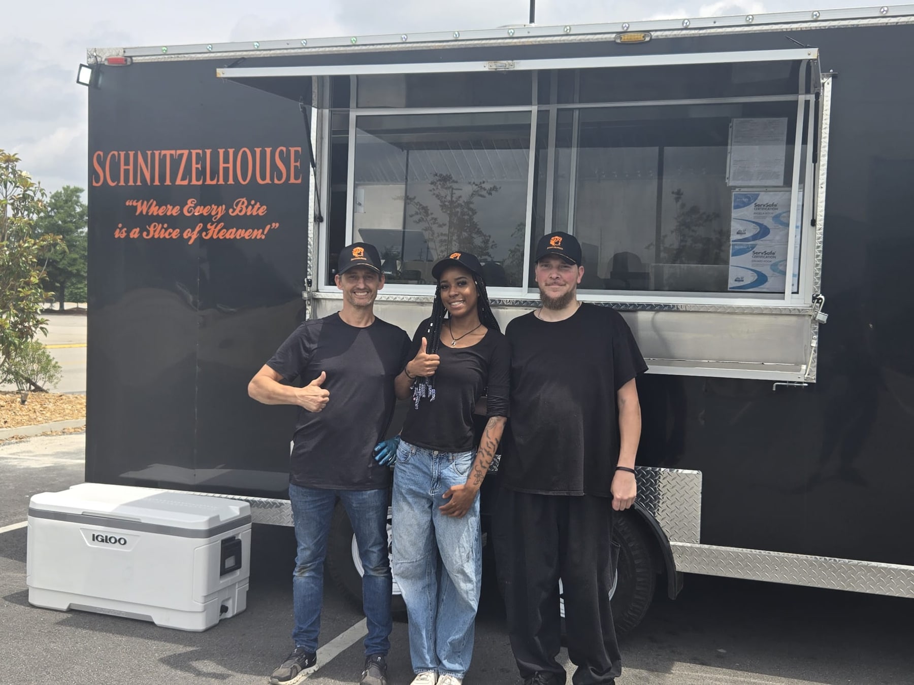 The Old Leo’s Schnitzelhouse team in front of the food truck